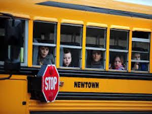 picture of kids riding a school bus
